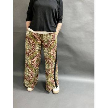 Штани зелені у яскравий принт