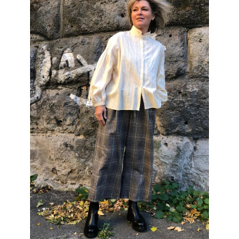 Штани-бермуди в клітинку з...